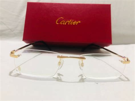 cartier gold rimless glasses.